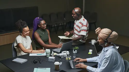 group of writers discussing work